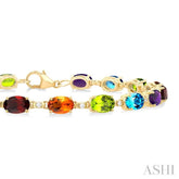 6X4 MM Oval Cut Multiple Gemstone and 1/6 Ctw Round Cut Diamond Semi-Precious Tennis Bracelet in 10K Yellow Gold